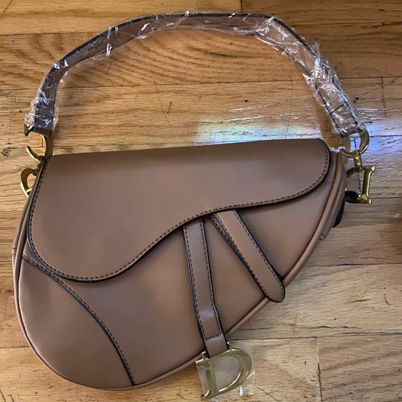 dior saddle strap price